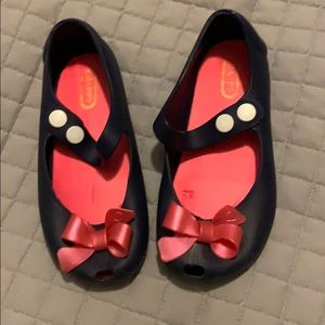 LIKE mini Melissa, not actual brand.